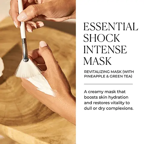 Image 1 - A person applying a creamy mask to their hand with a brush on a wooden surface, with the text ESSENTIAL SHOCK INTENSE MASK REVITALIZING MASK (WITH PINEAPPLE & GREEN TEA) A creamy mask that boosts skin hydration and restores vitality to dull or dry complexions. visible on the side.
Image 2 - A tube of Natura Bissé Essential Shock Intense Mask is shown beside a rock, with the text KEY BENEFITS and icons that indicate revitalizes, hydrates, and rejuvenates.
Image 3 - A woman with long hair smiles while holding her face, alongside text that reads INTENSIVE ANTI-AGING POWER and a description that states, This revitalizing mask delivers antioxidant benefits to help minimize visible signs of aging while soothing the skin, with icons indicating that the product is gluten free, alcohol free, oil free, and suitable for vegans.
Image 4 - A flat lay of three glass bowls containing different ingredients, with visible text on the right that describes the benefits of each ingredient: SCIENCE BEHIND IT GREEN TEA, VITAMIN A & C Provides antioxidants and anti-aging benefits. PINEAPPLE EXTRACT Concentrated Ananas sativus extract deeply nourishes and revitalizes. ALLANTOIN The extraordinary softening power of this ingredient provides a satiny finish.
Image 5 - Image of two skincare products on a wooden surface, one jar labeled Essential Shock Intense Cream and one tube labeled Essential Shock Intense Mask, with text above reading CAPTURE YOUR INNER BEAUTY and a description stating A series of intensive anti-aging treatments that promote deep hydration to restore younger-looking skin.