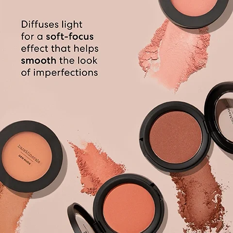 Image 1 - Four round blush compacts from bareMinerals in varying shades are displayed on a light background with loose powder swatches around them, accompanied by the text that reads Diffuses light for a soft-focus effect that helps smooth the look of imperfections.