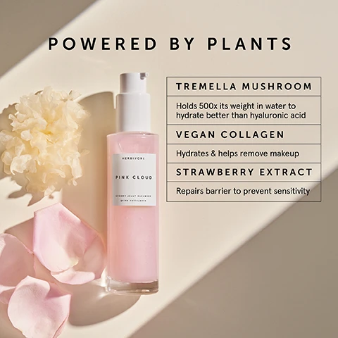 Image 1 - A pink bottle of Herbivore Pink Cloud creamy jelly cleanser is placed on a light background alongside flower petals, with text that reads Powered by Plants, Tremella Mushroom Holds 500x its weight in water to hydrate better than hyaluronic acid, Vegan Collagen Hydrates & helps remove makeup, and Strawberry Extract Repairs barrier to prevent sensitivity.
Image 2 - An abstract background of softly swirling cream and water droplets includes the text Creamy Gel to Gentle Lather.