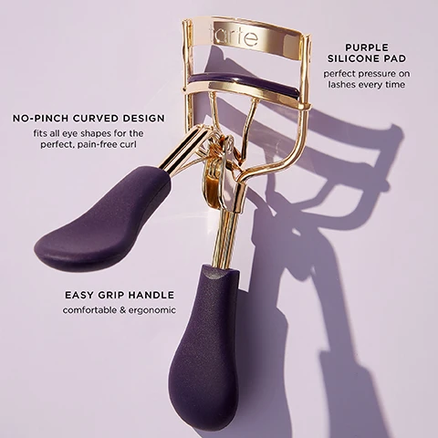 Image 1 - A gold eyelash curler with a purple silicone pad and ergonomic handles is displayed against a light background, featuring text that reads No-pinch curved design fits all eye shapes for the perfect, pain-free curl and Easy grip handle comfortable & ergonomic.
Image 2 - Image shows four close-up views of eyes arranged in a 2x2 grid with BEFORE labels on the top corners and AFTER labels on the bottom corners, illustrating the noticeable differences in appearance of eyelashes and eyelids before and after a treatment.
Image 3 - A close-up of a person applying mascara with a black mascara wand near their eyebrow, showcasing their glowing skin and glossy lips, with visible text stating 24-HR, flake-free, smudge-proof, and longwear.
Image 7-4 - A close-up of an eye showcasing the difference in eyelashes before and after applying Tartes Mini Lights, Camera, Lashes 4-in-1 Mascara, with the mascara tube and wand visible on the left. The text on the left reads MINI LIGHTS, CAMERA, LASHES™ 4-IN-1 MASCARA and the text above the right eye says AFTER, while the text above the left eye says BEFORE.