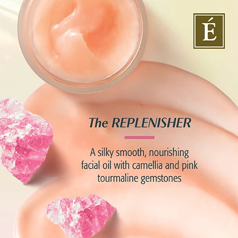 Image 1 - A close-up image of a small jar of facial oil surrounded by pink tourmaline gemstones on a creamy surface, with text stating The REPLENISHER and a description of a silky smooth, nourishing facial oil with camellia and pink tourmaline gemstones.
Image 2 - A jar of Éminence Organic Skin Care Camellia Glow Solid Face Oil sits on a pale background with two pink crystals beside it, and text states that 94% agree visible signs of dryness and dehydration are reduced.
Image 3 - An arrangement of colorful gemstones, including green malachite, pink quartz, and yellow citrine, with the text Infused With Gemstones, Powered by Nature underneath the letter É in a decorative box.
Image 4 - An image featuring a light pink background with several chunks of pink and amber crystals, alongside a white rectangular box that contains the text: Three fan-favorite formulas crafted with gentle yet potent natural ingredients.
Image 5 - The image showcases three skincare products from the Eminence Organic Skin Care Gemstone Collection, including a Charcoal Exfoliating Gel Cleanser, Camellia Glow Solid Face Oil, and Turmeric Energizing Treatment, with the text The Gemstone Collection and So Much More Than Skin Care prominently displayed.