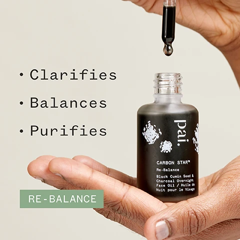 Image 1 - A hand holding a dropper bottle labeled Païl CARBON STAR™ Re-Balance Black Cumin Seed & Charcoal Overnight Face Oil with the words Clarifies, Balances, and Purifies displayed beside it, and a green rectangle below reading RE-BALANCE. Image 2 - An image of a dropper bottle with a dark serum and a drop of serum on a white surface, featuring the text 76% said skin looked clearer and logos for Soil Association, Cosmos Natural, Vegan, and Certified B Corporation, along with a note about a 4 week independent user trial on 49 subjects.