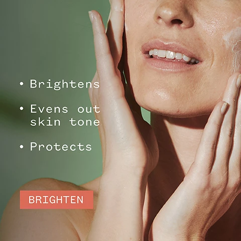 Image 1 - A woman with a glowing complexion is applying skincare to her face, with text beside her listing benefits: Brightens, Evens out skin tone, Protects, and a button labeled BRIGHTEN. Image 2 - A bottle of Pai C-2 Believe Vitamin C Brightening Moisturizer is displayed on a light background, accompanied by the text 91% agreed their skin looked more radiant* and logos for vegan and organic certifications, along with a note about a two-week consumer trial of 114 subjects.