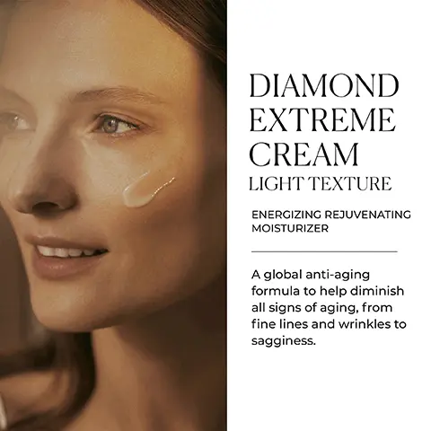 Image 1 - A woman is smiling with a small amount of cream on her cheek, alongside text that reads DIAMOND EXTREME CREAM LIGHT TEXTURE ENERGIZING REJUVENATING MOISTURIZER A global anti-aging formula to help diminish all signs of aging, from fine lines and wrinkles to sagging.
Image 2 - A jar of Natura Bissé Diamond Extreme light texture cream on a wooden surface, accompanied by icons representing key benefits: energizes, smooths, firms, balances, and replenishes, with the text KEY BENEFITS displayed prominently.
Image 3 - A woman smiles while holding a skincare jar, with text that reads THE ESSENCE OF AGELESS BEAUTY, and additional text detailing that the product is gluten free, alcohol free, oil free, and suitable for vegans.
Image 4 - Image shows three clear glass bowls containing different skincare ingredients, with a textured background, alongside text that reads: A SCIENTIFIC MASTERPIECE, SMART ENERGY COMPLEX, NIACINAMIDE & PLUMPING-EFFECT LIPIDS, COCKTAIL OF PREBIOTICS & ANTIOXIDANTS.
Image 5 - A display of skincare products on a rock surface with a light background, featuring bottles and jars labeled with brand names, accompanied by the text AGE-DEFYING EXCELLENCE Our advanced age-defying solutions infuse revitalizing energy into the skin for unprecedented results.