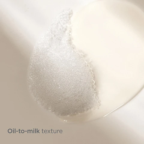 Image 1, oil to milk texture. image 2, effortlessly cleanses. hydrates and maintains moisture. illuminates skin. image 3, 85% ingredients of natural origin. bottle made with 50% recycled plastic. image 4, after 4 weeks of nightly use, users reported. 97% doesn't leave a sticky feeling. 90% leaves skin more radiant and luminous. 93% doesn't clog pores. 95% removes waterproof makeup. image 5, extra virgin olive oil - antioxidant and regenerates. sunflower oil - restores. clary sage - illuminates. image 6, apply onto dry hands and spread the oil onto your dry face. moisten skin with lukewarm water and massage the oil into an emulsion and rinse. image 7, join the loveisdin community. 1 = scan the QR code. 2 = earn points. 3 = enjoy rewards. join the loveisdin community. unique code guarantees quality and authenticity.