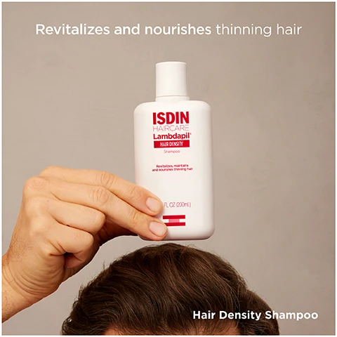 Image 1 - A hand holds a white ISDIN Lambdapil Hair Density Shampoo bottle above a persons head with brown hair, featuring text on the image that reads Revitalizes and nourishes thinning hair, with the bottle itself displaying ISDIN HAIRCARE Lambdapil HAIR DENSITY Shampoo, Revitalizes, maintains and nourishes thinning hair, 6.76 FL OZ (200mL), and additional text at the bottom stating Hair Density Shampoo. Image 2 - A white bottle of ISDIN Haircare Lambdapil Hair Density Shampoo stands on a red block against a red background, with visible text reading Boosts volume Supports hair growth, ISDIN HAIRCARE Lambdapil HAIR DENSITY Shampoo, Revitalizes, maintains and nourishes thinning hair, 6.7 FL OZ (200mL), and Hair Density Shampoo. Image 3 - A dark red graphic shows statistics that read: After 8 weeks, users reported: 72% hair was stronger, 91% product is suitable for hair loss, 84% hair looks healthier, and at the bottom, Data on file. ISDIN Corp. 2023. Morristown, NJ. Image 4 - A white ISDIN Haircare Lambdapil Hair Density Shampoo bottle is positioned on a red background with red liquid puddles, displaying text Serenoa serrulata fruit extract Supports hair growth, Zinc Nourishes and strengthens hair, D-Biotin Improves hair quality, Revitalizes, maintains and nourishes thinning hair, 6.7 FL OZ (200mL), and Hair Density Shampoo. Image 5 - A split image shows shampoo instructions on the left against a steamy background, and a woman from the back in a shower with wet dark hair and lather on her shoulders on the right. The visible text reads: Apply to wet. hair during your daily shower. Massage until it lathers. Rinse thoroughly. Repeat leaving the shampoo on hair and scalp for a few minutes. Rinse with plenty of water. Hair Density Shampoo. Image 6 - A close-up of a persons dark brown hair and shoulder, with a white review box overlaid displaying the text Belen G., four pink stars, and Best shampoo I have used. It helps your hair look and feel healthy. Image 7 - The image displays four white and grey ISDIN Lambdapil hair care products including a shampoo, a lotion with a spray nozzle, and two different types of capsules, arranged on red stepped platforms against a red background, with the visible text The complete range for hair care ISDIN HAIRCARE Lambdapil HAIR DENSITY Shampoo Revitalizes, maintains and nourishes thinning hair 6.7 FL. OZ (200ML) ISDIN HAIRCARE Lambdapil HAIR DENSITY LOTION WITH MELATONIN 3.4 FL. OZ (100ML) ISDIN HAIRCARE Lambdapil HAIR DENSITY Capsules ISDIN Lambdapil FOR MEN HAIR DENSITY Dietary supplement Capsules.