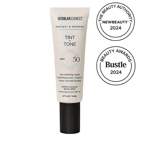 Image 2-dermstore-en_US - A light-colored tube of MDSOLARSCIENCES Tint + Tone SPF 50 Skin-Refining, Sheer Tinted Moisturizer with Vitamin C Green Tea and Rosehip, Dermatologist Developed, Broad Spectrum SPF 50, 1.7 FL OZ / 50ML, is displayed next to two award badges, The Beauty Authority NewBeauty 2024 and Beauty Awards Bustle 2024. Image 3-dermstore-en_US - The image displays a smear of skin-toned cream, a pile of green powder, and an orange slice with text describing their benefits for skin protection: PROTECT YOUR SKIN SPF 50 Broad-spectrum UV protection GREEN TEA Fights sun damage & protects skin from free radicals VITAMIN C Stimulates collagen production to firm skin. Image 4-dermstore-en_US - An image displaying various skincare ingredients including white cream, tan cream, clear gel, and aloe vera slices, accompanied by the text NOURISH YOUR SKIN, CERAMIDES COMPLEX Strengthens skin barrier & locks in hydration, NIACINAMIDE Improves skin texture & reduces redness, and ALOE Soothes & calms skin. Image 5-dermstore-en_US - A tube of MDSolarSciences Tint + Tone SPF 50 moisturizer with a black cap is displayed against a peach and orange gradient background, with product benefits listed to the left, which read: EVEN. BRIGHTEN. PROTECT. One-step tinted SPF 50 moisturizer. Evens skin tone for a natural glow. Synthetic fragrance free. Safe for sensitive skin. The text on the tube reads: MDSOLARSCIENCES PROTECT & NOURISH TINT + TONE SPF 50 Skin-Refining, Sheer Tinted Moisturizer, Vitamin C Green Tea and Rosehip DERMATOLOGIST DEVELOPED Broad Spectrum SPF 50 1.7 FL OZ / 50ML. Image 6-dermstore-en_US - A split image shows three women with diverse skin tones: one with fair skin touching her cheek, one with medium skin looking left, and one with dark skin smiling, all appearing to have a natural glow, with the text LIGHT COVERAGE FORMULA BLENDS INTO MOST SKIN TONES. Image 7-dermstore-en_US - A white tube of Mdsolarsciences Tint + Tone SPF 50 sunscreen with a black cap is shown on a light background next to a swatch of tinted cream, with accompanying text: DERMATOLOGIST DEVELOPED. BEAUTY-EXPERT APPROVED. 2024 BEST TINTED SUNSCREEN NEWBEAUTY. 2024 BEST SUNSCREEN FOR DRY SKIN Bustle. The product tube itself displays MDSOLARSCIENCES PROTECT & PERFECT TINT + TONE SPF 50 Skin-Refining. Sheer Tinted Moisturizer. Vitamin C Green Tea and Rosehip. DERMATOLOGIST DEVELOPED. Broad Spectrum SPF 50. 1.7 FL OZ / 50ML. Image 8-dermstore-en_US - The image features the text EXPLORE THE COLLECTION Scientifically formulated to elevate your everyday skincare routine, displayed above four MOSOLARSCIENCES products on a beige surface, which include a white Quick Dry Body Spray SPF 40, a white Tint Tone SPF 50 tube, a pink lipstick in a silver casing, and a white Wash Away One Step Cleanser tube. Image 9-dermstore-en_US - A smiling woman with blonde hair in a black top is featured next to text that reads: MDSOLARSCIENCES, DERMATOLOGIST - DEVELOPED • SPF + SKINCARE, SCIENCE ISNT OUR SECRET. ITS OUR STANDARD. At the heart of our brand is a commitment to true skin wellness, powered by science, elevated by luxury, and grounded in clean, feel-good formulas. RENEE PLATO, CEO.