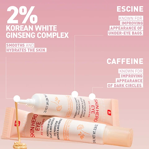 Image 1 - Two tubes of SKIN HERO EYE cream are displayed against a pink background, featuring text that reads 2% KOREAN WHITE GINSENG COMPLEX, SMOOTH AND HYDRATES THE SKIN, ESCINE KNOWN FOR IMPROVING APPEARANCE OF UNDER-EYE BAGS, CAFFEINE KNOWN FOR IMPROVING APPEARANCE OF DARK CIRCLES.
Image 2 - A woman with long dark hair applies a skincare product to her under-eye area, with a pink gradient background; visible text states IMMEDIATE SELF-ESTEEM BOOST 81% FELT THAT THE APPEARANCE OF DARK CIRCLES WAS MINIMIZED* AFTER 4 WEEKS ON BARE SKIN: DARK CIRCLES APPEAR VISIBLY REDUCED IN SIZE BY 49% AND COLOR BY 50%**.
Image 3 - A person with long black hair and a neutral expression holds a tube of eye cream, with a pink gradient background; visible text states clinically tested anti-fatigue eye perfector plus instant benefits visibly reduces appearance of dark circles boosts under eye radiance blurs appearance of fine lines around the under-eye area.
Image 4 - A side-by-side comparison of a womans face showing bare skin on the left and the same woman after using Skin Hero Eye on the right, with text labels BARE SKIN and WITH SKIN HERO EYE above each image, and the note that these are unretouched photos of an Erborian employee before and immediately after using Skin Hero Eye.
Image 5 - Image shows a side-by-side comparison of a womans face; left side labeled BARE SKIN shows her natural appearance, while the right side labeled WITH SKIN HERO EYE displays her complexion after using the product, with visible improvements in brightness and smoothness. The image includes small text at the bottom stating *Untouched photos of Erborian employee before and immediately after using Skin Hero Eye.
Image 6 - Image shows a side-by-side comparison of a womans face; the left side labeled BARE SKIN displays her natural skin, while the right side labeled WITH SKIN HERO EYE shows the same womans face after using a skincare product, with visible improvement in skin appearance. Text at the bottom reads *Unretouched photos of Erborian employee before and immediately after using Skin Hero Eye.*