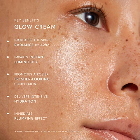 Image 1 - A close-up of a persons cheek showing glowy skin with freckles, alongside text highlighting key benefits of a glow cream including increases in radiance, instant luminosity, a fresher complexion, hydration, and plumping effect.
Image 2 - An open jar of Dr. Barbara Sturm Glow Cream reveals a creamy, light pink moisturizer inside, surrounded by key ingredient highlights including light-reflecting pearl pigments, triple hyaluronic acid, polygonum bistorta root extract, and wild rose extract, with text stating MADE IN GERMANY and additional effectiveness notes.
Image 3 - Image shows a divided close-up of skin before and after using Glow Cream, with visible text stating increases the skins radiance by 42%, imparts instant luminosity, delivers intensive hydration, and notes the study duration and participant count.
Image 4 - Image shows three skincare products arranged on a pink background: a cleanser, a hyaluronic serum, and a glow cream, with the text Essential STURMGLOW™ ROUTINE, Step 1 CLEANSER, Step 2 HYALURONIC SERUM, and Step 3 GLOW CREAM.
Image 5 - Image shows a skincare routine layout featuring four products by Dr. Barbara Sturm, including a cleanser, hyaluronic serum, glow cream, and glow drops, on a pink background with the title Enhanced STURMGLOW™ ROUTINE and descriptions for each step of the routine.
Image 6 - Image shows two skincare products from Dr. Barbara Sturm with a creamy background; on the left is a jar labeled GLOW CREAM with descriptions of its properties, and on the right is a dropper bottle labeled GLOW DROPS with its features listed; visible text includes USE TOGETHER FOR THE ULTIMATE STURMGLOW™.