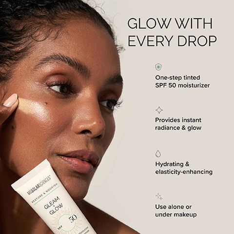 Image 2-dermstore-en_US - A woman with glowing skin applies a tinted product to her cheek, holding a tube of MDSOLARSCIENCES RESTORE & NOURISH GLEAM GLOW SPF 50 moisturizer & niacinamide, with accompanying text GLOW WITH EVERY DROP, One-step tinted SPF 50 moisturizer, Provides instant radiance & glow, Hydrating & elasticity-enhancing, Use alone or under makeup. Image 3-dermstore-en_US - Three women with light, medium, and dark skin tones are shown applying or wearing a light coverage foundation, demonstrating its blendability, with the text: LIGHT COVERAGE FORMULA BLENDS INTO MOST SKIN TONES. Image 4-dermstore-en_US - A woman with dark hair applies a red lip balm to her lips, with text on the left stating SUN-KISSED LIP CARE, Buildable sheer color with light sheen, Nourishing, hydrating, & moisturizing, Broad spectrum UV protection, Gluten-free & vegan, and text on the bottom right stating Hydrating Sheer Lip Balm in Ruby. Image 5-dermstore-en_US - A collage image shows a pink lip balm swatch and text, a woman with dark skin applying sheer pink lip balm, a woman with light skin holding the lip balm, and a close-up of lips with the balm applied, with the visible text Hydrating Sheer Lip Balm SPF 30, Dream, A fresh, flirty hint of pink. Image 6-dermstore-en_US - A pink lip balm in a silver tube with its cap off, displaying MDSOLARSCIENCES written vertically on the cap, with three award badges to the right reading TRIPLE THREAT BEAUTY AWARDS EDITORIALIST 2023, SKINCARE AWARDS Womens Health 2023, and BEST LIP BALM WITH SPF GOOD HOUSEKEEPING 2021. Image 7-dermstore-en_US - A silver tube of red lipstick with a red lipstick smear on a light background, accompanied by text that reads: DERMATOLOGIST-DEVELOPED. SKIN-EXPERT APPROVED. Many women forgot to protect their lips, reaching for their pretty lipstick and leaving the most vulnerable skin on the face exposed to the elements. This nourishing yet protective SPF lipstick provides both the pretty pop of color, and the necessary UV protection to reduce the risk of skin cancer. Love this brilliant product! -DR. SARAH DOLDER, MD GREENWICH POINT DERMATOLOGY GREENWICH, CT