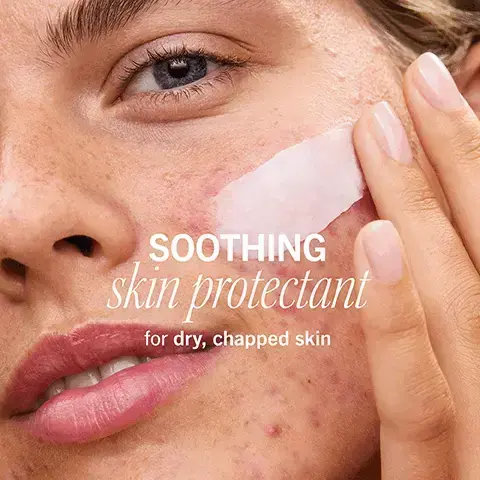 image 1, Image 1 - A close-up of a persons face applying a cream to their cheek, with visible text that reads Soothing skin protectant for dry, chapped skin.
Image 2 - A close-up image of a tubes nozzle dispensing a cream, with visible text that reads Formulated with 1% Dimethicone for instant skin relief.
Image 3 - A young woman applies a cream to her face, which has visible acne, while the text reads soothes IRRITATION from prescription-strength acne + retinoid treatments.
Image 4 - A hand holding a dollop of creamy product from a tube with the text rich + luxurious yet breathable formula overlaying the image.
Image 5 - A close-up image showing a womans face comparing the skin under her eye before and after treatment, with visible text stating STRENGTHENS damaged skin barrier above and BEFORE and IMMEDIATELY AFTER on the respective sides.
Image 6 - A partially squeezed tube of First Aid Beauty cream with a smooth, white, cream-like substance coming out, and the words Colloidal OATMEAL improves skin surface renewal 2 times faster
Image 7 - A smiling woman with medium skin tone has facial cream applied to her cheeks and forehead, with visible text that reads non-comedogenic + wont clog pores.
Image 8 - Two tubes of First Aid Beauty Ultra Repair Rescue Barrier Balm, one labeled FULL SIZE and the other TRAVEL SIZE, with a creamy balm swatch in between them.
Image 9 - Image shows two moisturizer products side by side with the heading WHICH MOISTURIZER IS right for you? The left product is a jar labeled ULTRA REPAIR CREAM with a description stating Intense hydration that’s lightweight but luxurious and USE: DAILY. The right product is a tube labeled ULTRA REPAIR with a description stating Instant relief for dry, sensitive, chapped skin and USE: EMERGENCY.