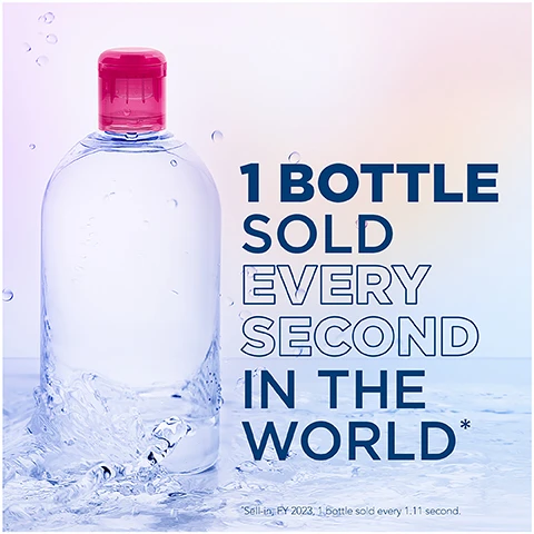 Image 1 - A clear plastic water bottle with a pink cap is surrounded by water splashes, and the text reads 1 BOTTLE SOLD EVERY SECOND IN THE WORLD* *Sell-in FY 2023, 1 bottle sold every 1:11 second. Image 2 - A clear bottle of Bioderma Sensibio H2O micellar water is centered in the image against a softly blurred pink and blue background, with the text 30 YEARS repeated in large white letters behind it. Image 3 - A person with medium skin tone holds a bottle of Bioderma Sensibio H2O micellar water, with visible text highlighting its features: powerful & deep cleansing efficacy, lasting soothing action, and for a respected sensitive skin ecosystem. Image 4 - An abstract representation of micelles with blue and black spherical shapes radiating from the center, accompanied by the text Micellar Technology and a description that explains micelles are inspired by the skins lipids and capture impurities while preserving the skins natural protective film. Image 5 - A close-up of a womans face showing smooth skin and subtle makeup, with visible text stating -99% make-up, pollution, pollen* and a note about instrumental measurement after a single application. Image 6 - A close-up of a womans face with natural makeup, showing her skin texture, and overlaid with steps for a skincare routine that reads: 1. Soak a reusable cotton-pad and apply SENSIBIO H2O, 2. Cleanse and remove make-up from face and eyes, 3. No need to rinse-off for skincare benefits.