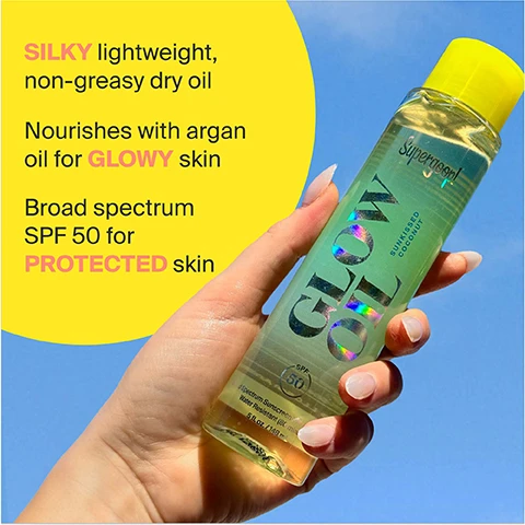 Image 1 - A hand holds a bottle of Supergoop! Glow Oil, a silky lightweight non-greasy dry oil that nourishes with argan oil for glowy skin and offers broad spectrum SPF 50 for protected skin, with text highlighting these features on a bright yellow background.
Image 2 - A hand holds a bottle of nourishing dry oil with a bright yellow cap, placed against a background of smooth, radiant skin, featuring text that reads NOURISHING DRY OIL, no greasiness.
Image 3 - An image of a bottle labeled SUNKISSED COCONUT with a yellow cap, surrounded by a coconut half, splashes of liquid, and lemon slices, featuring text that describes the scents as bright Italian lemon zest, fresh coconut and green fig, and sweet tonka beans and Madagascar vanilla.
Image 4 - Two bottles of body glow oil are displayed on a light background; the left bottle labeled Sunkissed Coconut with relaxing amber wood and the right bottle labeled Beach Flower with playful floral amber, both featuring the text Limited Edition.
Image 5 - Image shows a bottle of Supergoop! Glow Oil surrounded by flowers, with the text BEACH FLOWER prominently displayed at the top, followed by the words PLAYFUL Ylang Ylang, Freesia, FLORAL Gardenia, Wild Orchid, and EARTHY Cedar Wood, Marine Accord.
Image 6 - A person holds a bottle of Glow Oil against a bright yellow background, with text on the bottle stating that it is silky, lightweight, non-greasy dry oil that nourishes with argan oil for glowy skin and has broad spectrum SPF 50 for protected skin.
Image 7 - A hand holds a bottle of Glow Oil against a dark skin tone, with visible text stating Nourishing Dry Oil, no greasiness.