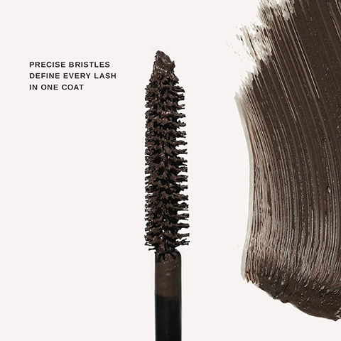 Image 1 - A mascara wand with precise bristles is shown next to a smudge of dark mascara with the text that reads, PRECISE BRISTLES DEFINE EVERY LASH IN ONE COAT.
Image 2 - A split image showing a womans face with one side bare and the other side enhanced with mascara, with visible text WITHOUT on the left and WITH Mile High Club™ in shade ESPRESSO on the right.
Image 3 - A close-up of two paint swatches side by side: the left swatch labeled Jet Black and the right swatch labeled Espresso.