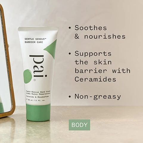 Image 1 - A tube of hand cream labeled pati Gentle Genius™ Barrier Care stands beside a small mirror on a countertop, with bullet points listing its benefits: soothes and nourishes, supports the skin barrier with Ceramides, and non-greasy.