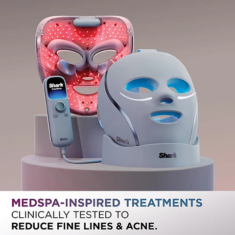 Image 1 - An array of skincare devices is displayed, including a red light therapy mask, a handheld control unit labeled Shark CryoGlow, and a white mask with blue accents, accompanied by text that reads MEDSPA-INSPIRED TREATMENTS CLINICALLY TESTED TO REDUCE FINE LINES & ACNE.
Image 2 - A woman with long blonde hair is using a facial device resembling a mask that emits red light, while the image includes text stating REDUCE FINE LINES IN 8 WEEKS and Better Aging treatment: Red + Infrared Light along with a timer showing 6 MIN.
Image 3 - A woman with short, light-colored hair is looking at a futuristic black facial device emitting blue light in a softly lit environment, with text displaying REDUCE ACNE IN 4 WEEKS** Skin Clearing Treatment: Blue, Red + Infrared Light and 8 MIN on the image.
Image 4 - A woman is shown with glowing skin next to a large, black, facial treatment device emitting pink light, with text that reads MAINTAIN BRIGHT, GLOWING SKIN Skin Sustain Treatment: Red, Infrared + Blue Light Use after completing an 8-week cycle of Better Aging or Skin Clearing. 4 MIN.
Image 5 - A close-up of a mans face showing a skincare device near his under-eye area with glowing blue patterns indicating treatment, accompanied by text that reads VISIBLY TIGHTEN UNDER EYES IN MINUTES Under-Eye Revive Treatment 3 adjustable chill levels to refresh under eyes in one use and 5-15 min.
Image 6 - An illustration showing a layered skin structure with emitted light in blue, red, and deep infrared wavelengths, labeled as Blue Light (415nm) with the text Helps kill acne-causing bacteria where it lives, Red Light (630nm) with Helps reduce the appearance of lines & wrinkles, and Deep Infrared (830nm) labeled as Stimulates collagen production and helps reduce lines & wrinkles, at the bottom noting iQLED TECHNOLOGY and a description of dermatologist-optimized treatments.
Image 7 - Image showing a comparison of skin before and after using a skincare treatment, with the left side labeled Before and the right side labeled After 8 weeks, highlighting improvements in skin texture around the mouth area, and the text at the bottom reads Better Aging Treatment CLINICALLY TESTED TO REDUCE FINE LINES & FIRM SKIN IN 8 WEEKS.
Image 8 - Image shows a side-by-side comparison of a forehead where the left side displays a few visible acne spots labeled Before and the right side shows clearer skin labeled After 4 weeks, with text at the bottom stating Skin Clearing Treatment CLINICALLY TESTED TO REDUCE ACNE, BREAKOUTS & EVEN COMPLEXION.
Image 9 - A hand holding a white Shark Cryoglow remote with an LCD display showing skincare instructions and various labeled features inclu
Image 10 - A diverse group of seven individuals with various hairstyles and skin tones stand closely together against a gradient background, with visible text at the bottom that reads DEVELOPED WITH DERMATOLOGISTS FDA CLEARED BACKED BY CLINICAL TESTING DRY OILY NORMAL COMBINATION SENSITIVE.
Image 11 - A man and a woman are standing back to back, with the woman holding a white facial mask up to her face; visible text includes COMFORT FIT FOR ALL FACE SHAPES & SIZES Fully adjustable for a personalized fit.