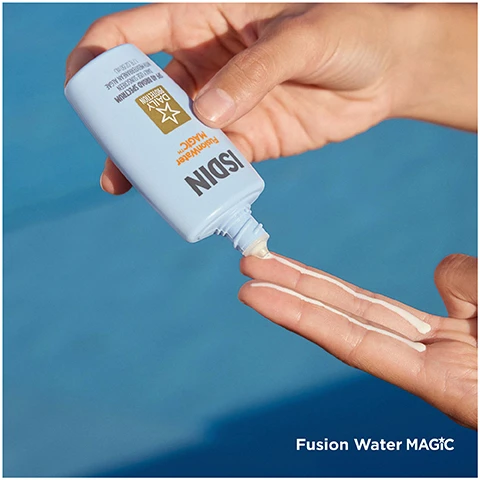 Image 1 - A person is holding a light blue bottle of ISDIN Fusion Water Magic sunscreen while some sunscreen is being poured onto their palm, with visible text that reads Fusion Water MAGIC.
Image 2 - Two bottles of ISDIN Fusion Water sunscreen and moisturizer are shown against a light blue background, with a small dollop of product nearby; the image includes text that reads 2-in-1 Sunscreen & Moisturizer, Pairs perfectly with makeup, and No streaking, white cast or pilling.
Image 3 - Image of a bottle of ISDIN FusionWater MAGIC sunscreen with a light blue label featuring a star icon and text highlighting its 5-star formulation, including non-greasy, UVA, UVB, and blue light protection features, along with benefits such as invisible coverage, pollution defense, and 12-hour hydration with hyaluronic acid.
Image 4 - A smiling woman applies a white cream to her face on the left, and the right side shows a black and white image of the same woman with visible markings on her skin, labeled Protection seen on UV camera.
Image 5 - Image shows a light blue background with a tube of ISDIN product tilted to the right, spilling some lotion, and statistics listed beside it: 100% felt the product leaves no greasy residue, 96% felt there is no white cast or pilling, 96% said it plays well under makeup, and 92% would recommend the product.
Image 6 - A light blue bottle of ISDIN FusionWater MAGIC sunscreen with the phrase 360° PROTECTION FROM and a list of protective benefits including Sunburn, Photoaging, Blue Light Damage, Free Radical Damage, Heat Damage, and Pollution, with SPF 40 BROAD SPECTRUM DAILY USE SUNSCREEN WITH HIFERMENTAL ALGAE displayed on the bottle.
Image 7 - An image featuring a light blue background with a close-up view of a smooth surface, displaying text that reads Mediterranean Algae, Provides antioxidant action, Hyaluronic Acid, Deeply hydrates and retains moisture, and Vitamin E, Helps to neutralize free radicals.
Image 8 - A light blue sunscreen bottle labeled ISDIN FusionWater MAGIC with a background of clear blue sky, listing features such as dermatologist tested, non-comedogenic, tested to not irritate eyes, and vegan, along with the text “Science-Driven Formula” at the top.
Image 9 - A woman with a light complexion applies sunscreen to her cheek against a blue background, with text that reads Apply liberally 15 minutes before sun exposure Reapply at least every 2 hours.