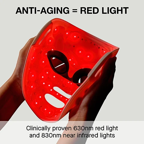 Image 1 - A pair of hands holds an illuminated red LED face mask, with the text ANTI-AGING = RED LIGHT at the top and Clinically proven 630nm red light and 830nm near infrared lights at the bottom. Image 2 - A womans face is illuminated with red light from a white LED therapy mask on the left, with visible text below stating: Smooths fine lines & wrinkles, Boosts collagen & elastin, Rejuvenates & brightens skin. Image 3 - A pair of hands holds a flexible purple LED face mask illuminated with many small purple lights, displaying the text ANTI-ACNE = PURPLE LIGHT and Clinically proven 630nm red light and 440nm blue light. Image 4 - A woman holds a white LED light therapy device with pink lights to her face, which is partially illuminated by the pink glow, with text that reads: + Clears blemishes & breakouts + Helps treat & clear mild to moderate acne + Reduces breakouts & blemishes + Calms redness & inflammation + Supports skin renewal. Image 5 - A red and pink glowing LED facial mask is displayed next to a smartphone showing the FACE GYM app for custom zone selection, with the visible text UNLOCK A PERSONALISED LED TREATMENT, Customise your light settings across the forehead, eyes, nose and cheeks, Zone selection, Anti-Aging, Anti-Acne, Forehead, Eyes, Nose, Cheeks, and GET STARTED. Image 6 - A white facial mask with black eye and mouth openings rests next to a white drawstring storage pouch with black and white speckled straps; both the mask and pouch display the text FACE GYM. and the image also lists features: Hands-free design, 10-minute treatments, Semi-flexible fit, Adjustable head strap, Built-in eye protection, Storage pouch.